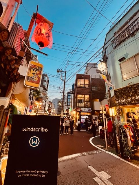 Photo of the streets of Shimokitazawa, with Windscribe's flier in view